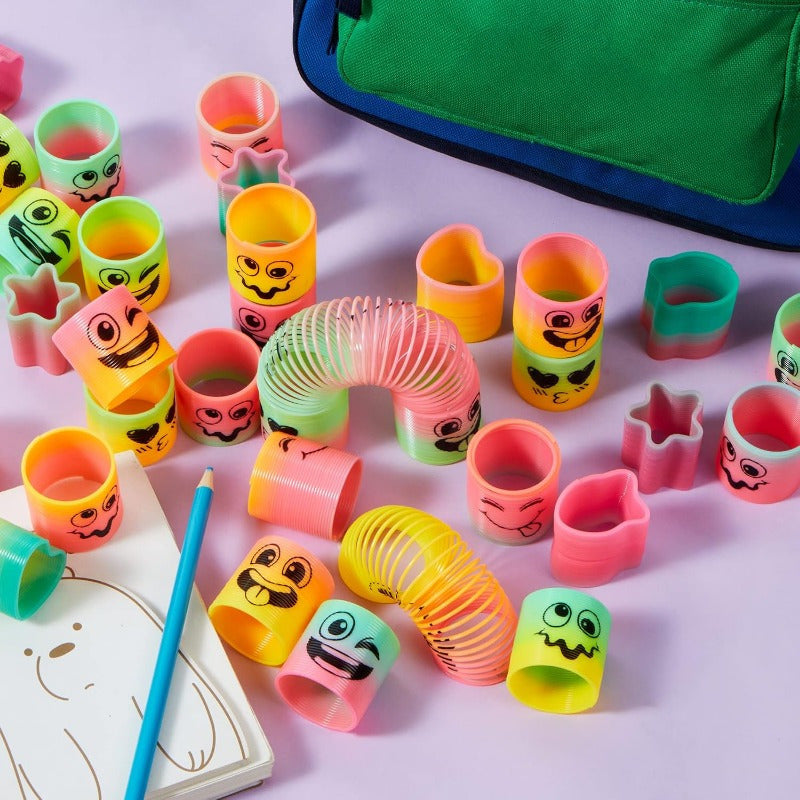 60pcs Spring Rainbow Party Favor, Plastic Toy, Fidget Stress Coil Mini Springs Bulk Toys for Carnival Prize Party, Goodie Bag Stuffers, 60pcs Party Favors for Kids Mini Spring Toys Plastic Coil Rainbow Fidget Toy Party Supplies for Birthday Goodie
